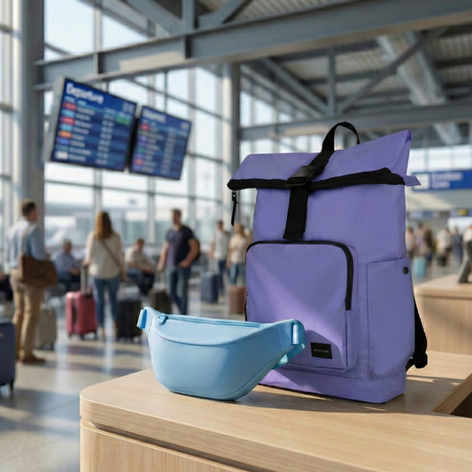 Combo Banano Silicona Celeste y Mochila Saxoline Preston Roll Top Violeta 35 L