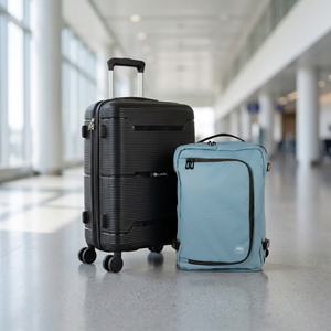Combo Maleta de Cabina Conguillío 49L Negra + Mochila de Viaje Viral Dakota 32L Azul Piedra Llaima