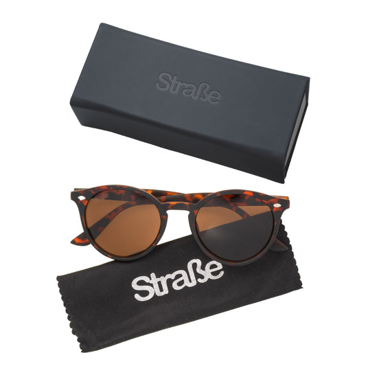 Combo Bandolera Cruzado Navigator + Lentes de sol Rostock color café + Botella Plegable Gout 700ML Negra